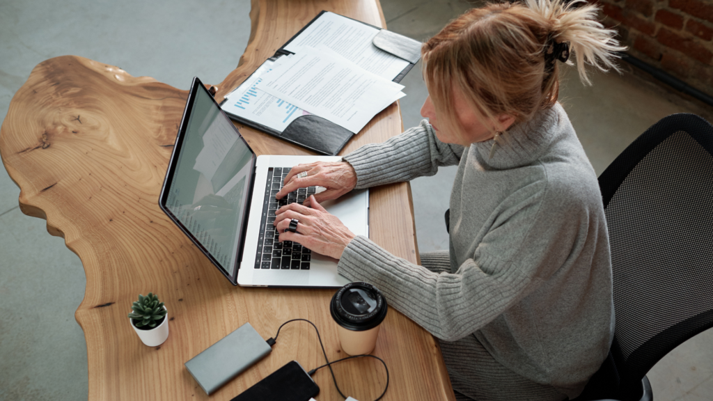 Women at table planning and reporting
